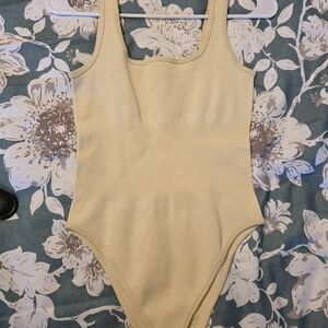 Elegant Cream Ribbed Bodysuit